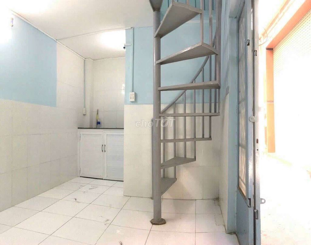 Modern Two-Story House with Spiral Staircase