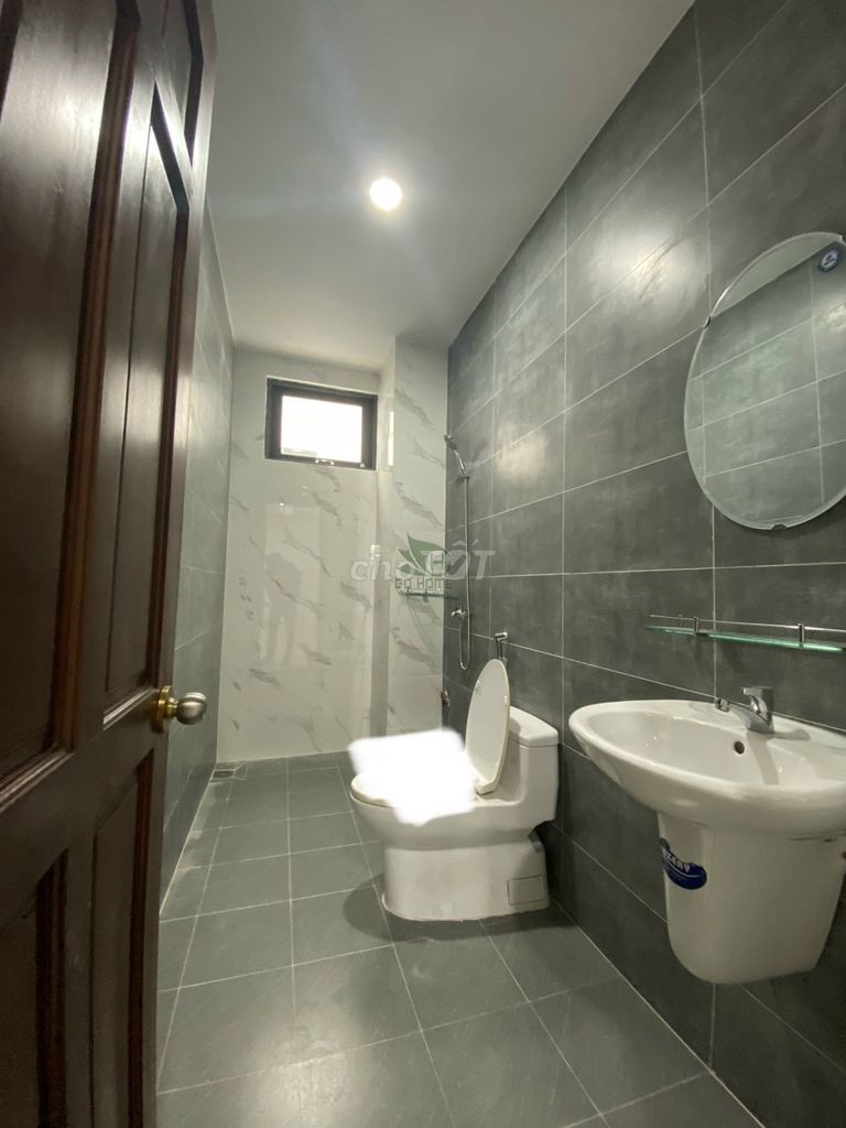 Modern 4-Bedroom Townhouse with Parking in Phuoc Long