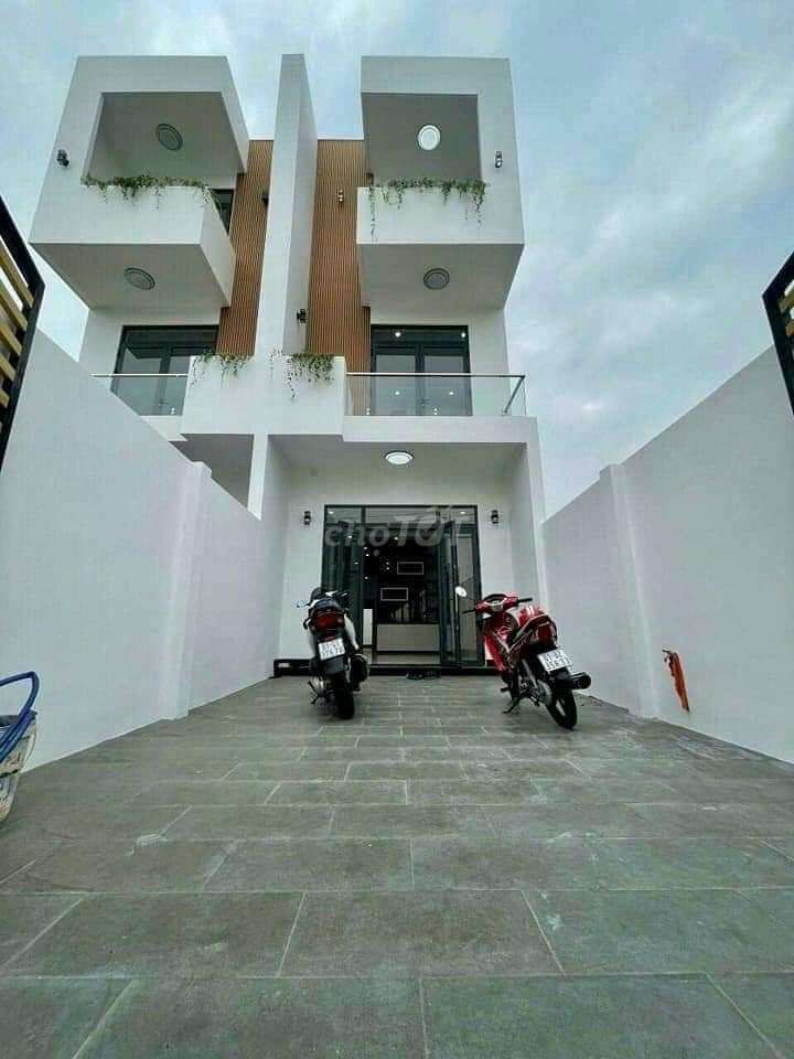 Modern Three-Story House with Car Park in Phu My