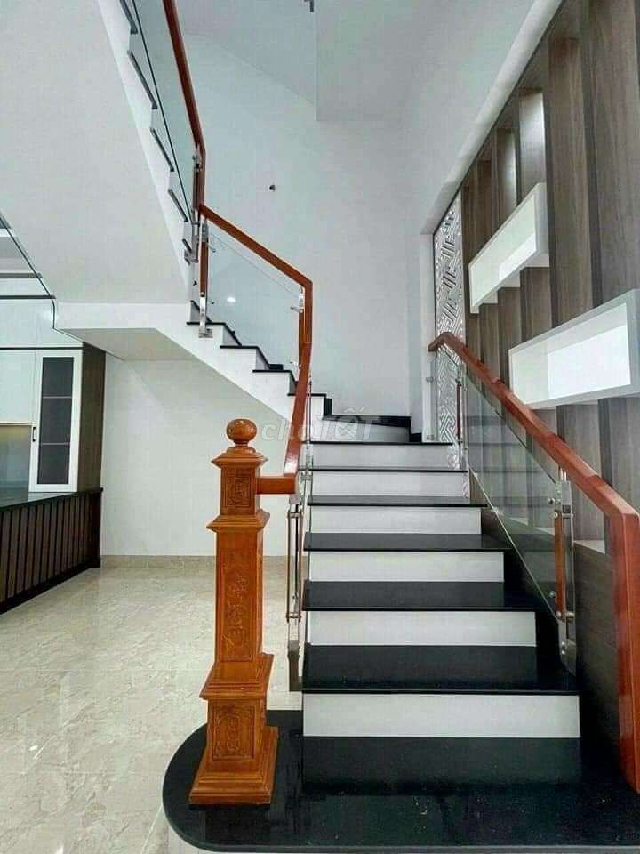 Modern Three-Story House with Car Park in Phu My