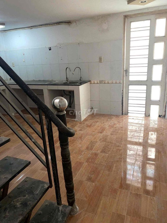 Spacious Mezzanine Townhouse in Hiep Thanh Q12 - Ideal for Business