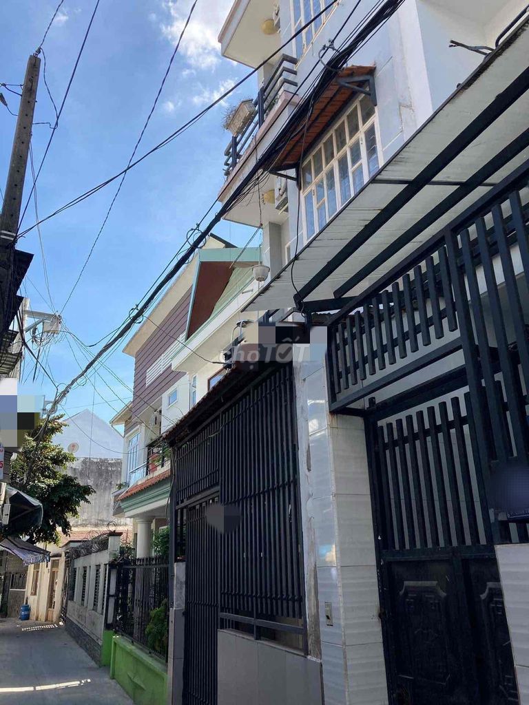 Modern Three-Story House with Parking in Thu Duc