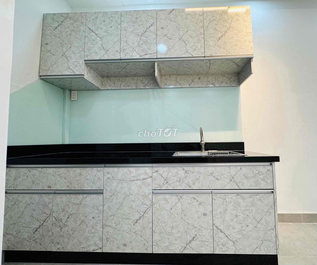 4-Story House near District 1 with Modern Kitchen and Secure Location