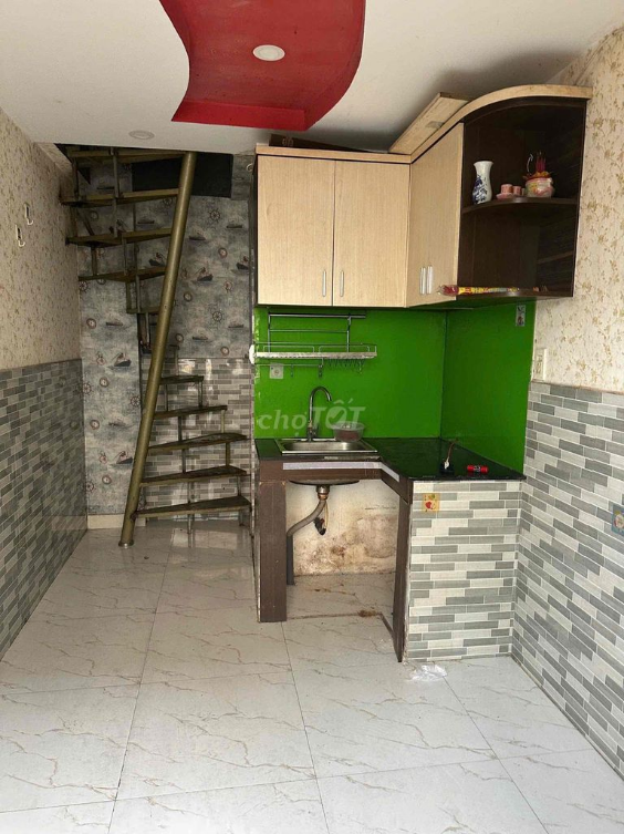 Small House in Phu Tho Hoa with Compact Layout