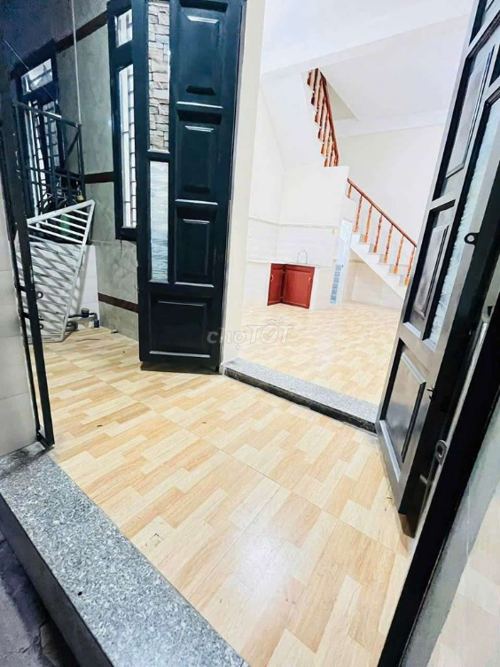 Compact 2-bedroom house near Nguyen Du street with parking