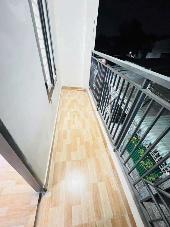 Compact 2-bedroom house near Nguyen Du street with parking