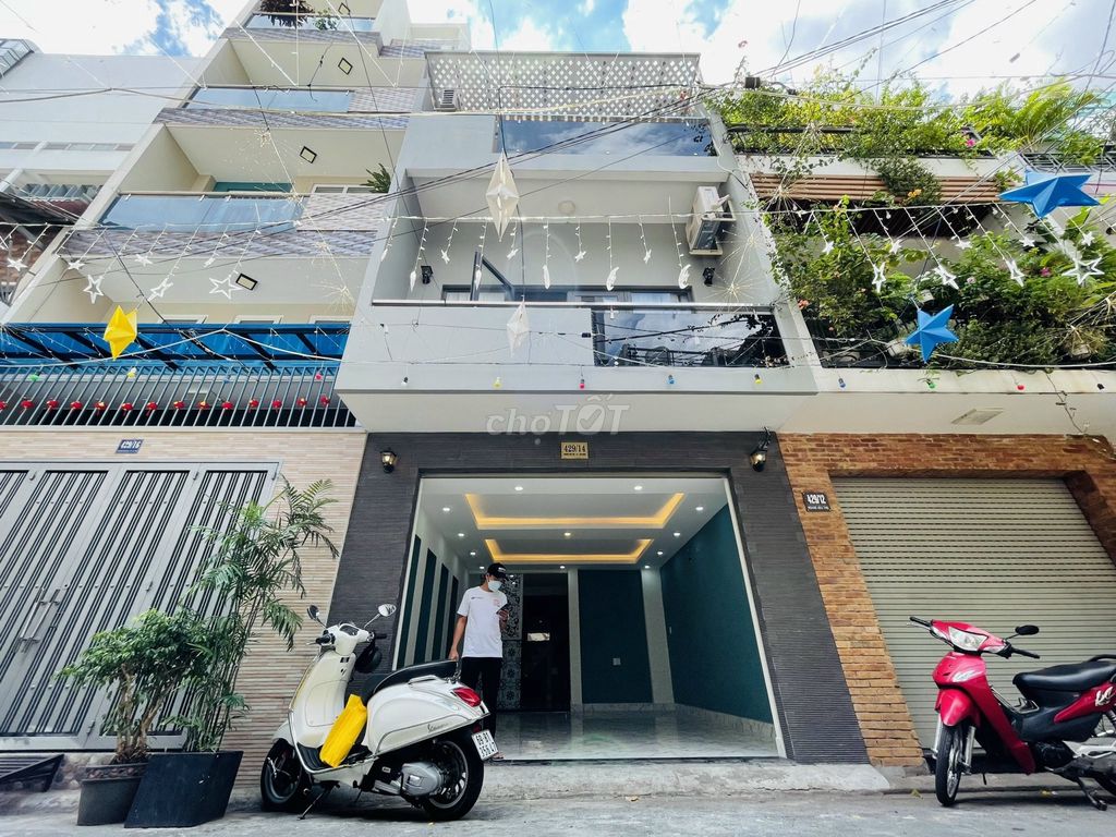 Modern 4-Bedroom House with Parking in Tan Binh