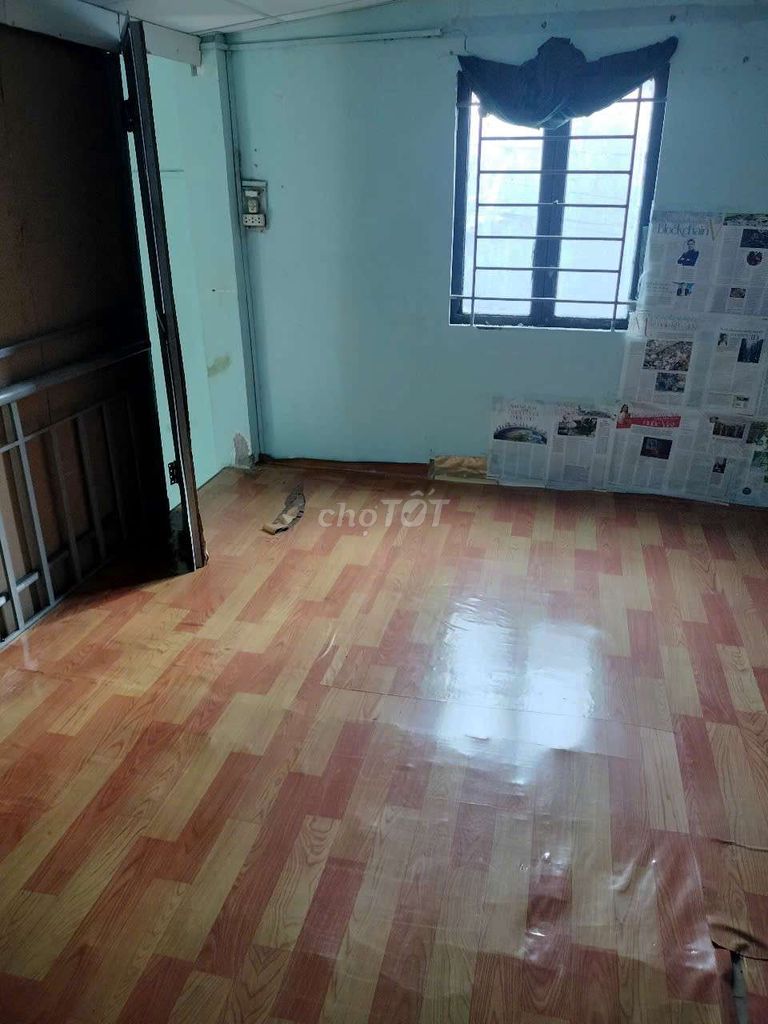 Compact Two-Level House Near Buu Minh Temple