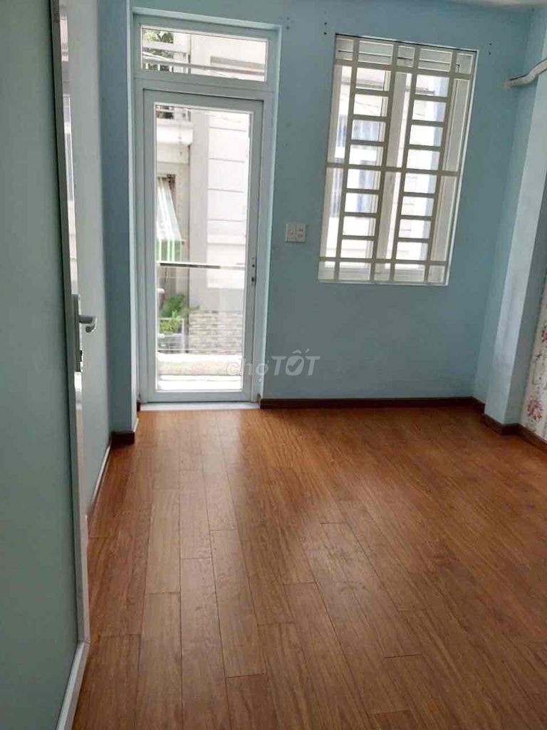 Modern 3-Level Townhouse with Rooftop in Phu Nhuan