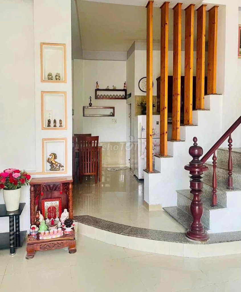 Modern Two-Story House with Furniture Near Bridge