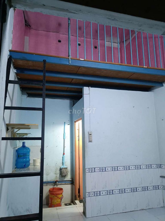 Compact Loft-Style Room with Mezzanine in Narrow Alley