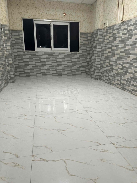 Small House in Phu Tho Hoa with Compact Layout
