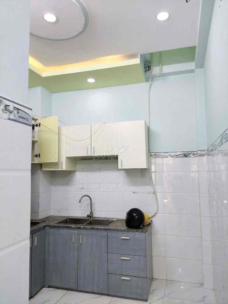 Modern 3-Level Townhouse with Rooftop in Phu Nhuan