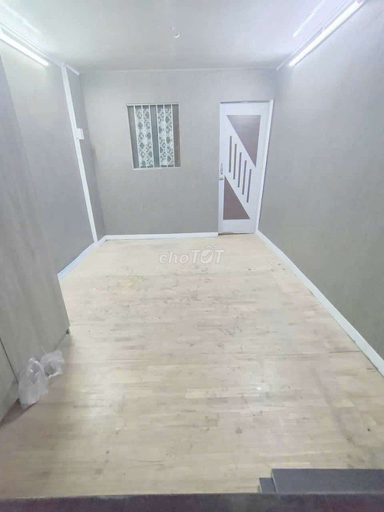 Compact 2-Story House with Wooden Lofts