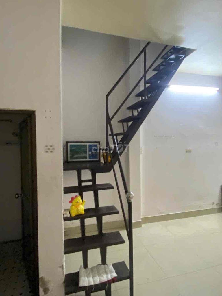 Two-Story House with Balcony and Car Access