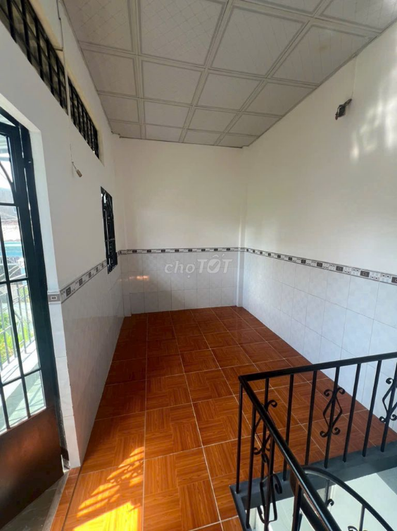Compact 1-Story + Balcony House near Market, Well-Lit and Spacious