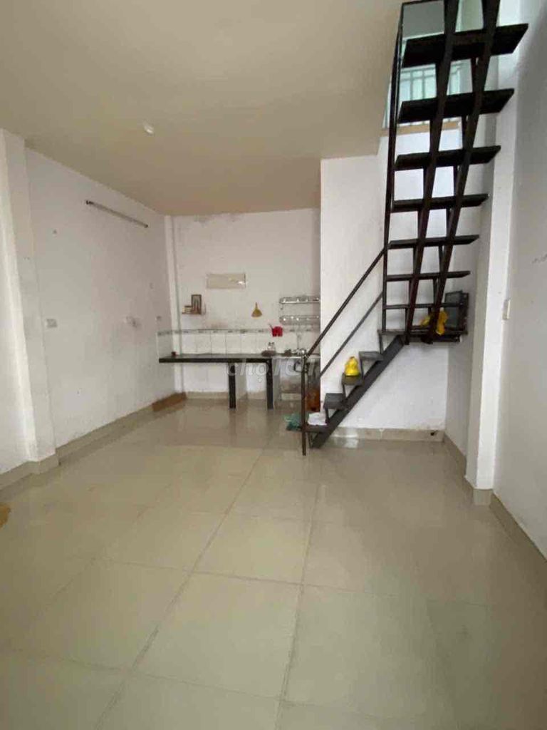 Two-Story House with Balcony and Car Access