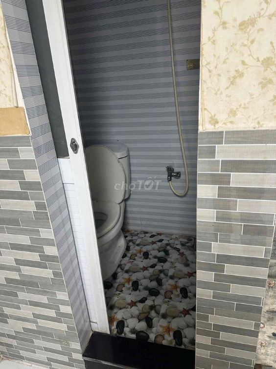 Small House in Phu Tho Hoa with Compact Layout