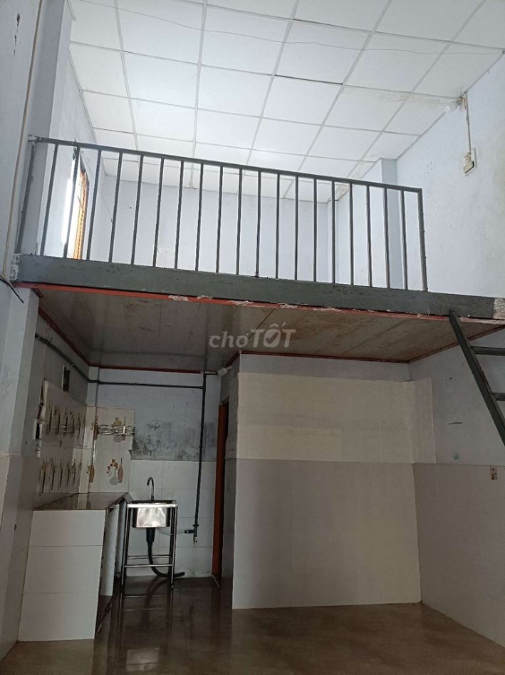 Compact Loft-Style Room with Mezzanine in Narrow Alley