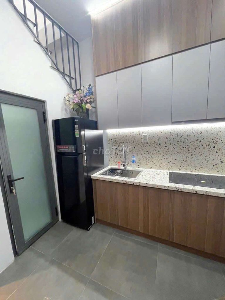 Modern 2-Story Townhouse with Balcony in District 3