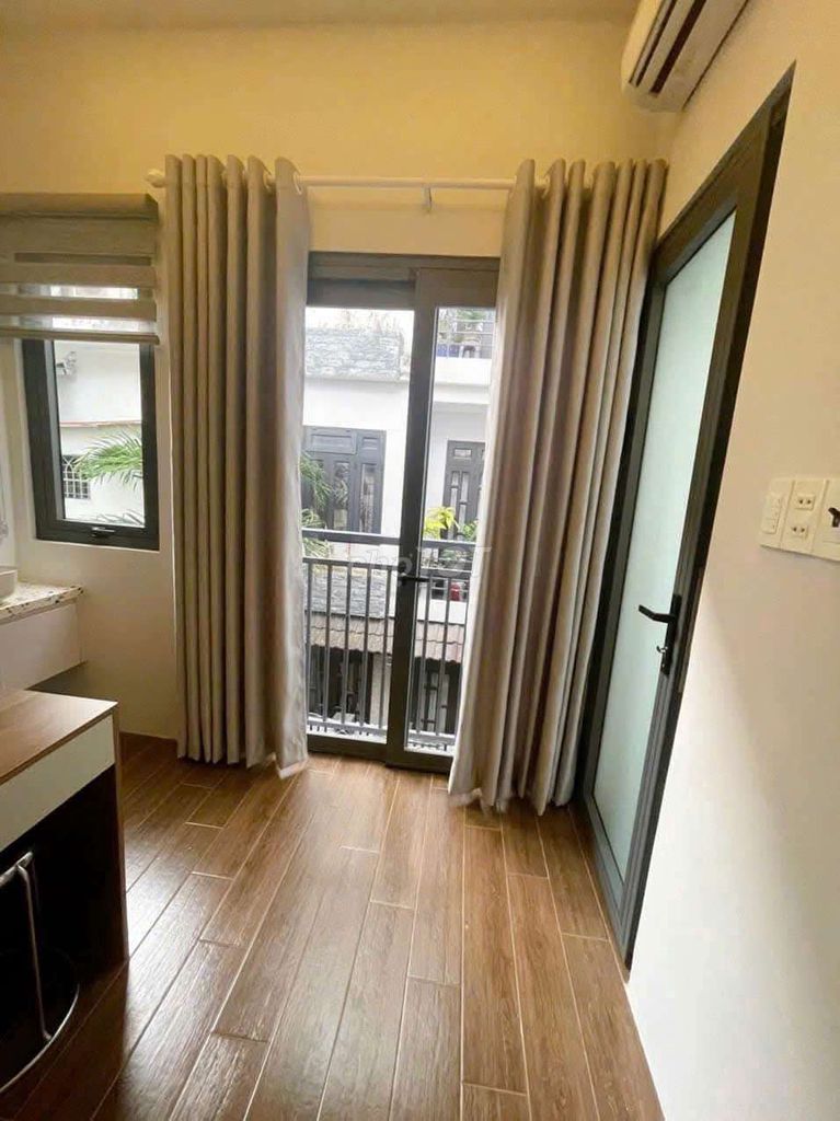 Modern 2-Story Townhouse with Balcony in District 3