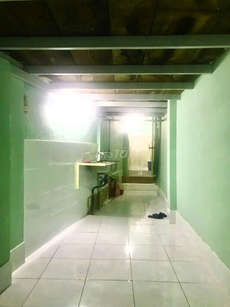 Green Painted Apartment with Large Frontage
