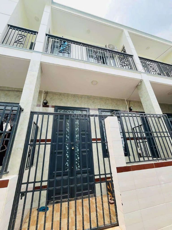 Compact 2-bedroom house near Nguyen Du street with parking
