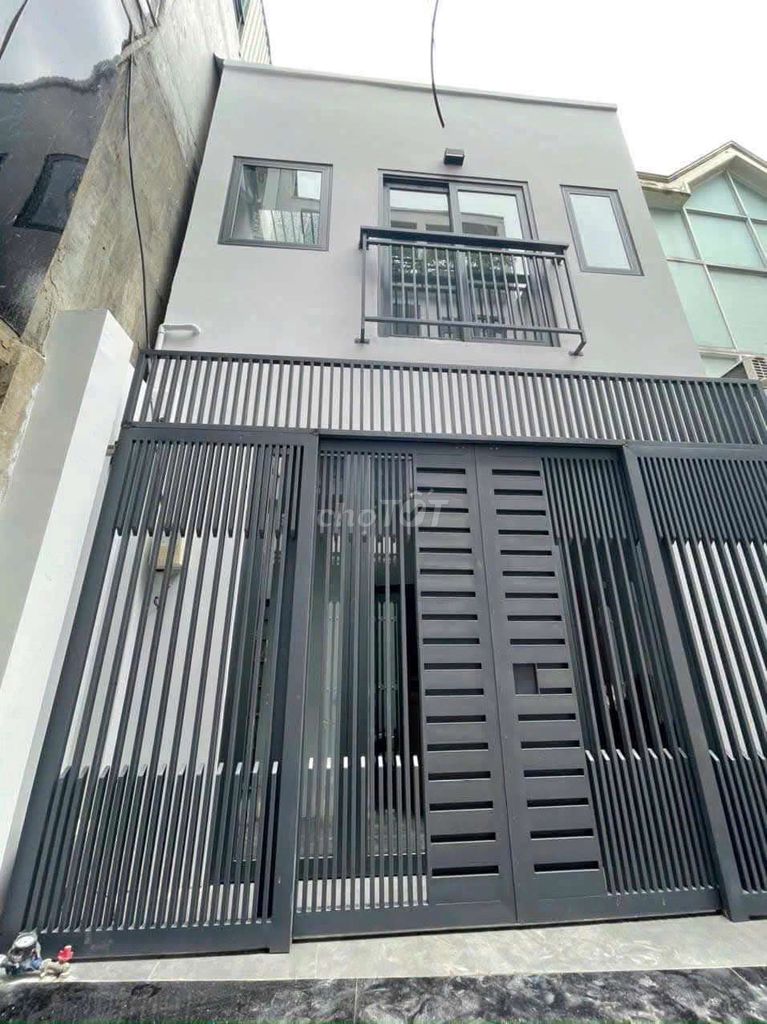 Modern 2-Story Townhouse with Balcony in District 3