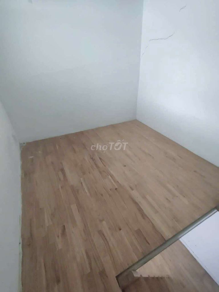 Compact 2-Story House with Wooden Lofts