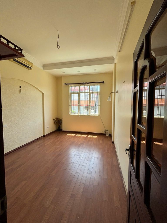 3-Story House with Spacious Parking and Multiple Rooms