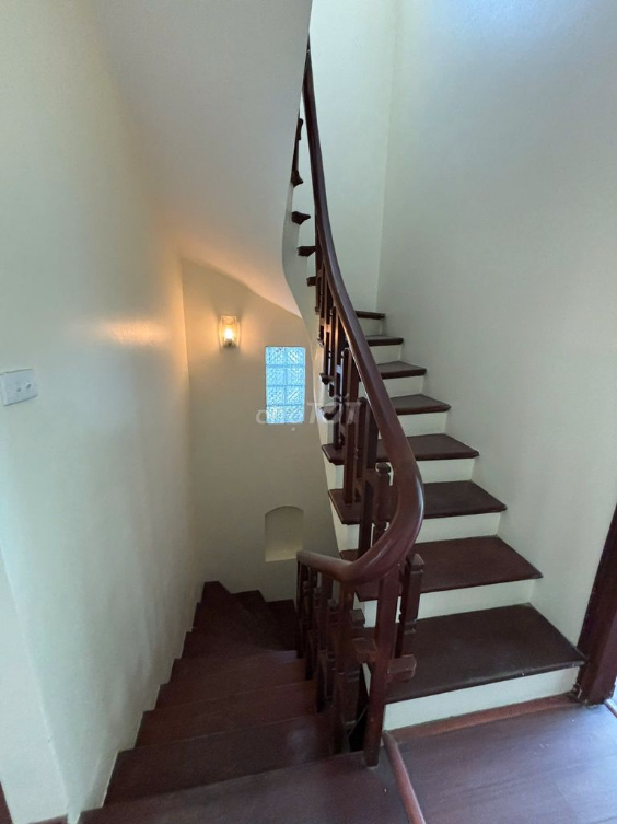 3-Story House with Spacious Parking and Multiple Rooms