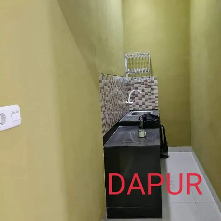 Modern House Near Garut Square with Carport