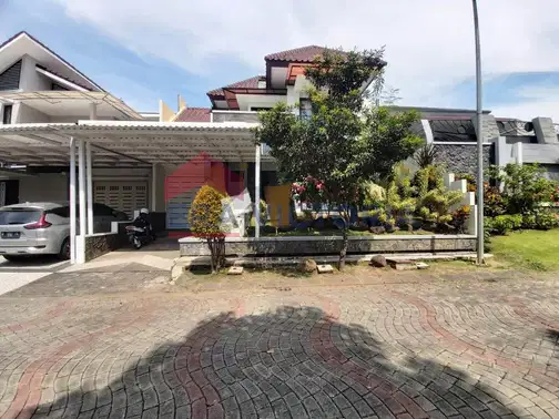 Minimalist 2-Story House with Front and Rear Gardens in Ijen Nirwana Residence, Malang