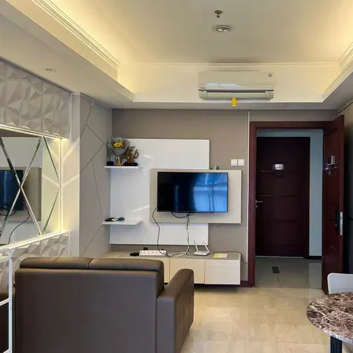 Fully Furnished 1BR Apartment at Royal Mediterania Garden Residence
