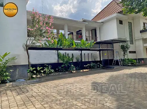 Spacious 2-Story Property with Multiple Rooms and Extensive Facilities