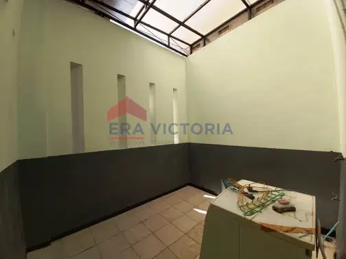 Minimalist 2-Story House with Front and Rear Gardens in Ijen Nirwana Residence, Malang