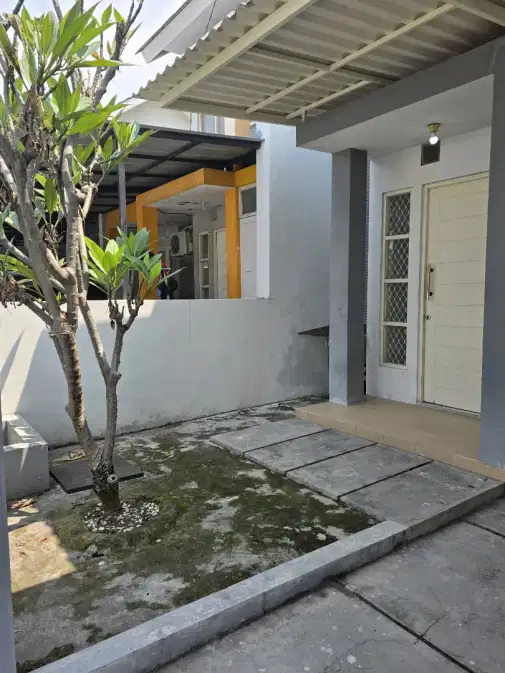 Compact 2-Bedroom House with Carport and Water Supply