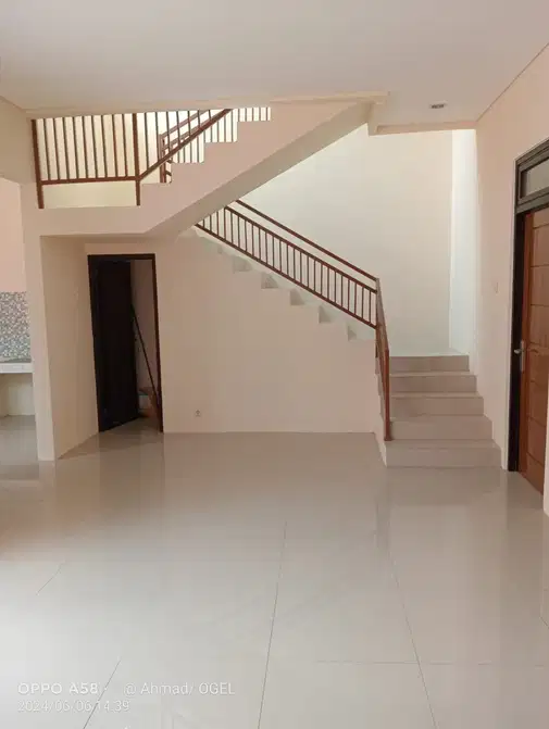 Modern Two-Story House with Multiple Rooms and Amenities