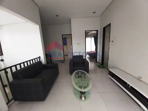 Minimalist 2-Story House with Front and Rear Gardens in Ijen Nirwana Residence, Malang