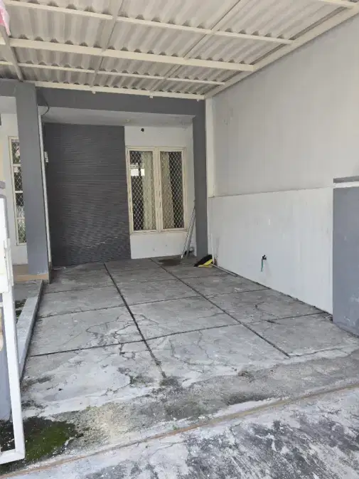Compact 2-Bedroom House with Carport and Water Supply