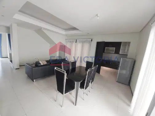 Minimalist 2-Story House with Front and Rear Gardens in Ijen Nirwana Residence, Malang