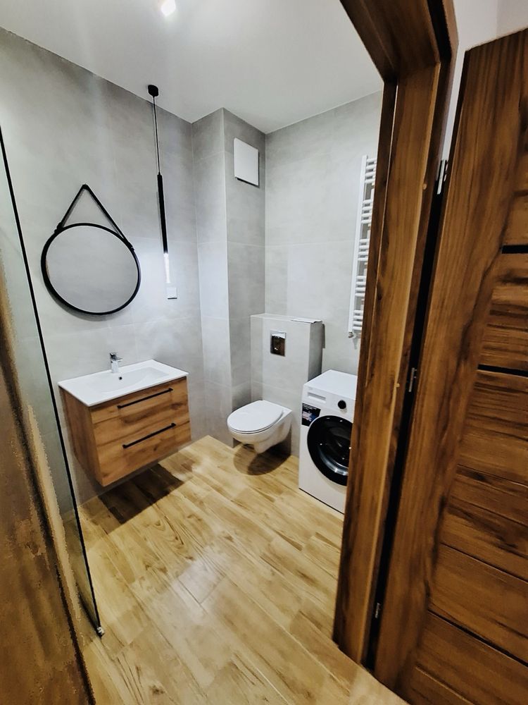 Modern 2-Bedroom Apartment with Balcony and Parking