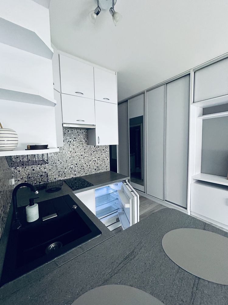 Compact Studio Apartment in Luboń with Convenient Location