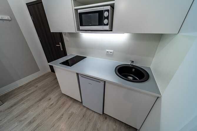 Тарихи ғимараттағы 18м² ықшам студиялық пәтер