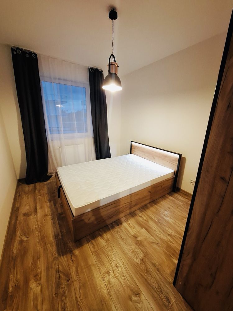 Modern 2-Bedroom Apartment with Balcony and Parking