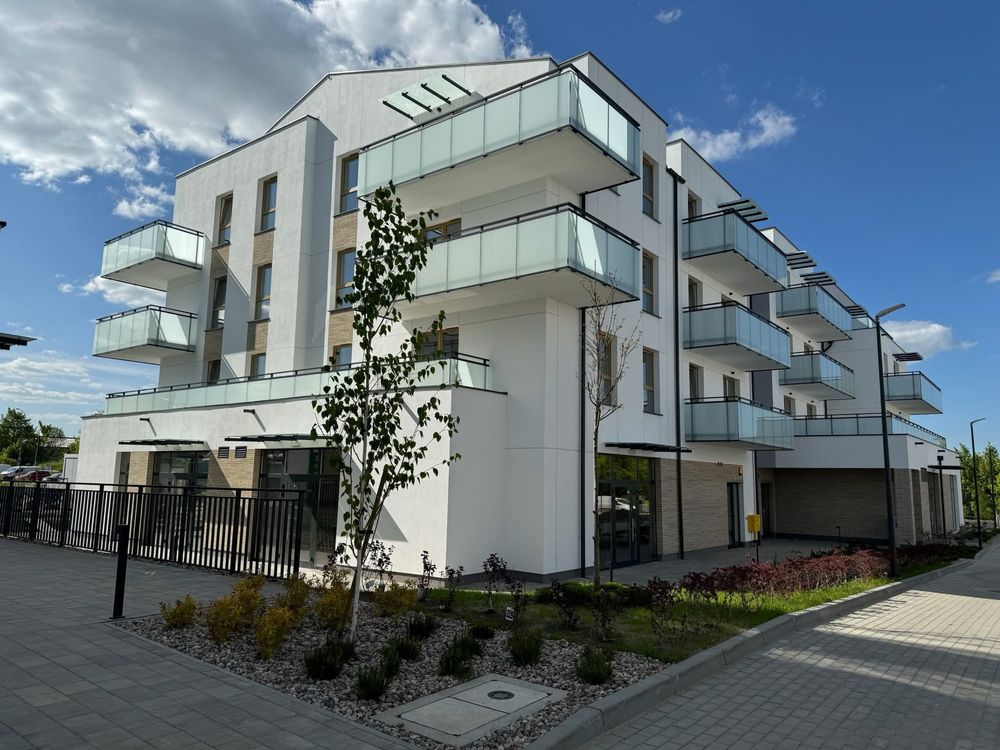 Modern 2-Bedroom Apartment with Balcony and Parking
