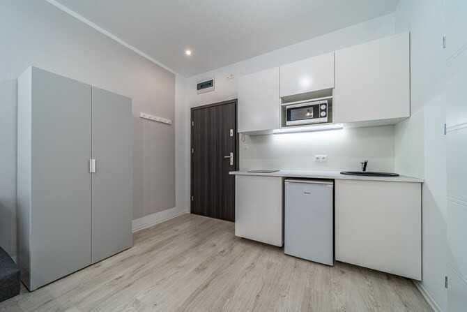 Тарихи ғимараттағы 18м² ықшам студиялық пәтер