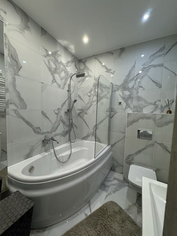 One-bedroom studio apartment with separate sleeping area