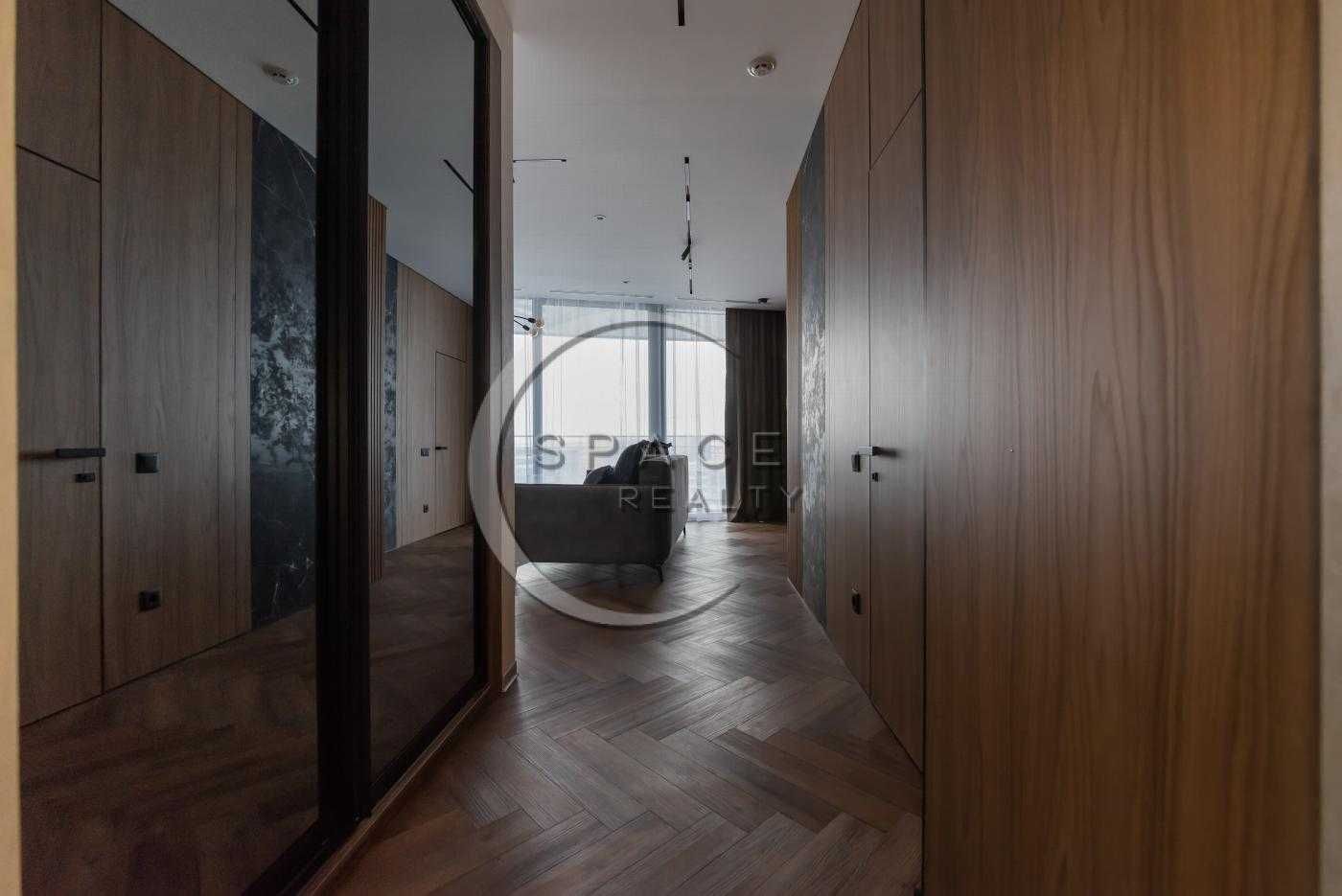Modern Minimalist Apartment with Wooden and Marble Accents