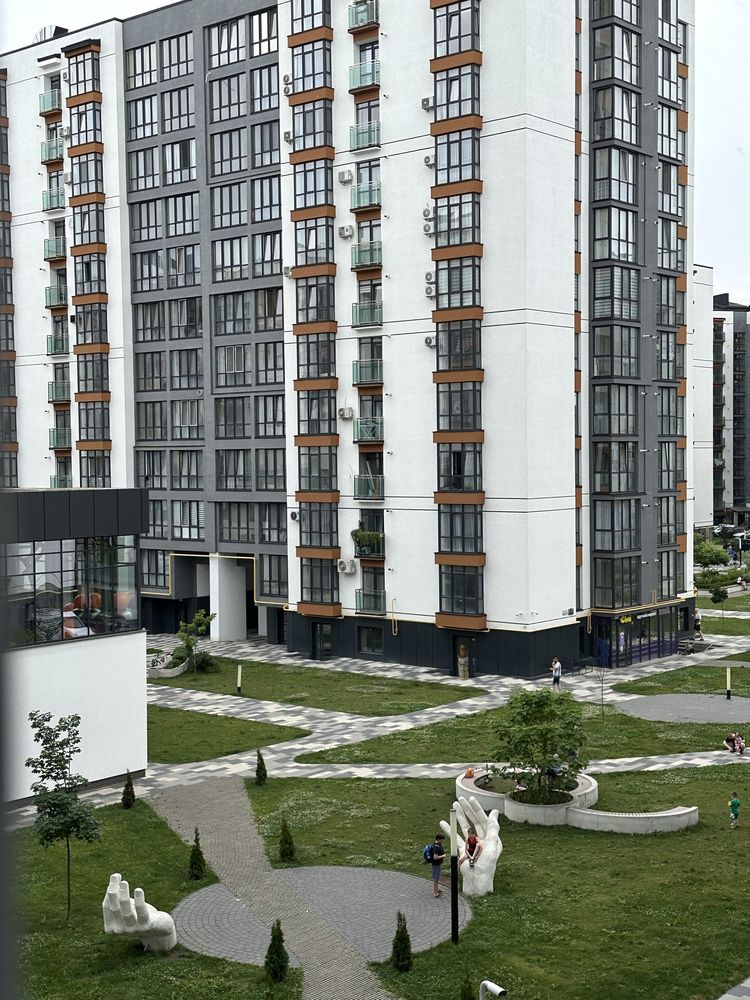 Жиналқылы үй кешеніндегі заманауи дизайны бар ыңғайлы пәтер